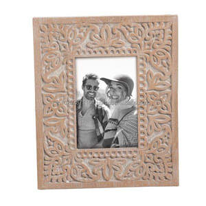 Traditional handcrafted <b>wooden</b> <b>photo</b> <b>frame</b> for cultural home decor walls with heritage influence skilled artisans timelees - Product Image 1