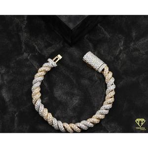 Luxury Statement <b>Bracelet</b> Featuring Interwoven <b>White</b> and Yellow Gold Links Covered with Sparkling Moissanite - Product Image 1