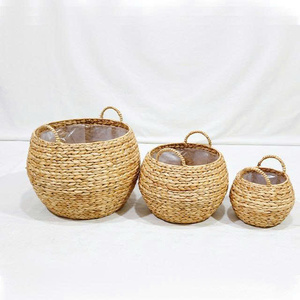 Minimalist Multifunction Set of 3 Woven Water Hyacinth <b>Belly</b> <b>Baskets</b> with Plastic Liner - Product Image 1