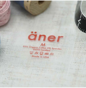 Étiquettes thermocollantes personnalisées en tissu écologique de haute qualité pour vêtements (frontale et dos) avec bord découpé au laser - Product Image 1