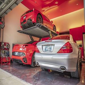 Plataforma hidráulica para elevación de coches al por mayor, fabricada con columnas de acero reforzado, sistema de bloqueo seguro y espacio eficiente - Product Image 6