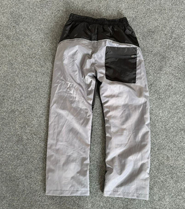 กางเกงแทร็คไนลอนลายกราฟิกทันสมัยสำหรับผู้ชาย เอวยางยืด ทรงหลวม น้ำหนักเบา กันลม แต่งแถบสีตัดกัน จำหน่ายส่ง - Product Image 2