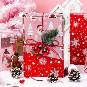 Carta da Regalo Natalizia Rosa con Design Babbo Natale e Foresta Innevata, Reversibile e Lucida con Lamina Metallica per Confezioni Regalo Festive - Product Image 3