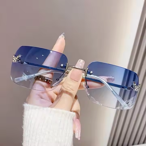 Newly Arrived MingAo Model 81062 Fashion Butterfly Design UV400 Protection Rimless <b>Frame</b> Unisex Sunglasses for Travel Outdoor - Product Image 2