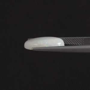 โอปอลธรรมชาติสีขาวรับรองโดย IGI น้ำหนัก 4.76 กะรัต รูปทรงวงรี ขนาด 15x11.5 มม. ผ่านการเคลือบแว็กซ์/น้ำมัน คุณภาพดี จากอินเดีย - Product Image 2