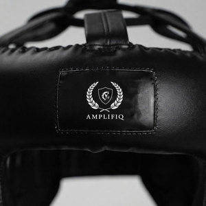 Casque de boxe haute performance pour hommes, léger, respirant, en polyester écologique, idéal pour l'entraînement, ajustement confortable, sangles réglables, convient à tous. - Product Image 4