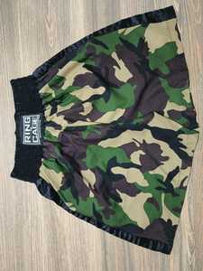 Shorts de Muay Thai de haute qualité avec tissu à séchage rapide, taille élastique et soutien flexible pour les mouvements, idéal pour la salle de sport, OEM. - Product Image 5