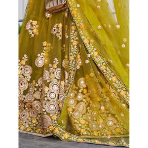 Ravishing <b>Green</b> Mirror Embroidered <b>Net</b> Lehenga Choli for Wedding Reception - Product Image 1