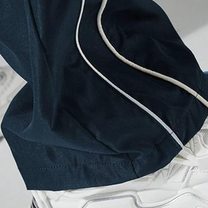 กางเกงแทร็คผู้ชายทรงหลวมสไตล์ OEM แฟชั่นสตรีทแวร์ พิมพ์ลายปัก งานโรงงาน - Product Image 6