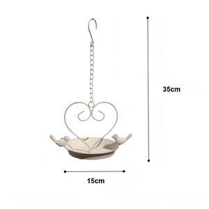 Los bebederos para pájaros de metal con revestimiento blanco desarrollan una hermosa pátina con el paso del tiempo, añadiendo carácter y encanto a la decoración exterior. - Product Image 3
