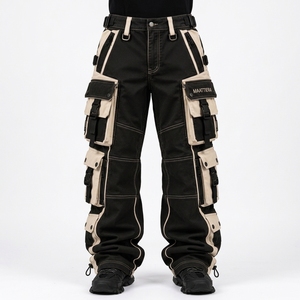 Pantalon cargo noir et beige pour homme avec empiècements contrastants, design multi-poches, sangles à boucle réglables, coupe large, style streetwear utilitaire - Product Image 1