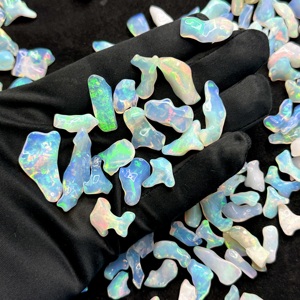 Pierres précieuses brutes en vrac polies par opale éthiopienne naturelle pour la fabrication de bijoux Pierres d'opale brutes de haute qualité à prix de gros - Product Image 1
