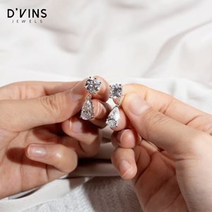 ดีวินส์ จิวเวลส์ต่างหูเพชรทรงลูกแพร์ 18k ทองคำแท้ รุ่น DJ 123 สี D แฟนซีไลท์ - Product Image 4