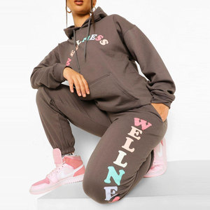Women's Gray Hooded Tracksuit <b>Set</b> With Colorful Wellness Print Full Length Casual Loose Fit Cotton Joggers And Sweatshirt - Product Image 1