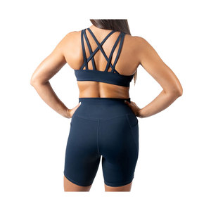 Ensemble de sport décontracté et élégant 2 pièces en coton pour femme – Soutien-gorge de sport couleur unie et short de yoga longueur genou avec boutons décoratifs, finition délavée, durable - Product Image 4