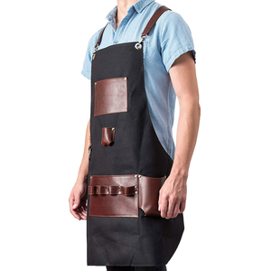 Unisex Black Twill Chef Uniform Bib Apron with Brown Leather Pockets <b>Adjustable</b> <b>Straps</b> for Restaurant & Bar Use - Product Image 1