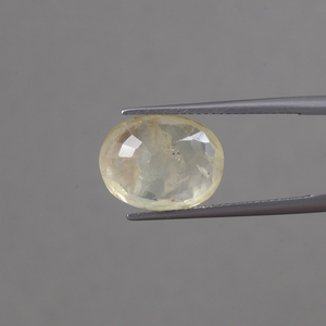 พลอยแซฟไฟร์สีเหลืองทรงรีขนาด 14x11 มม. น้ำหนัก 9.52 กะรัต รับรองโดย IGI แท้ 100%  ผ่านการเคลือบแว็กซ์/น้ำมัน เปลี่ยนสีได้ คุณภาพพรีเมียม - Product Image 3