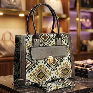 Sac fourre-tout de luxe à motif géométrique, résistant à l'eau et antivol pour femmes, sac à main en jacquard avec garniture en cuir PU et fermeture à loquet métallique - Product Image 1