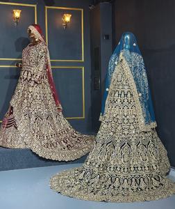 Lehenga คอลเลกชันกำมะหยี่จาก taaj ดีไซเนอร์พร้อมลายปักหนาและงานหินในสี่สีที่หรูหรา - Product Image 1