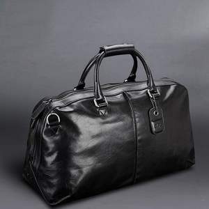Nuevo bolso de viaje informal para hombre de cuero genuino, impermeable, en oferta en línea a bajo precio. - Product Image 1