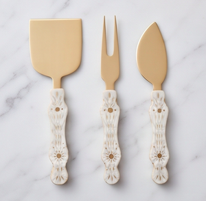 Juego de 3 cuchillos para queso de acero inoxidable dorado con mangos decorativos de cerámica para uso en la cocina - Product Image 1