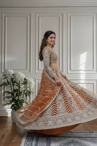 Lehenga Choli Orange FATEMA FASHION de créateur moderne avec broderie blanche complexe et travail de sequins, accompagné d'un dupatta assorti - Product Image 3
