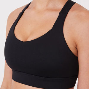 เสื้อชั้นในกีฬาสำหรับผู้หญิง OEM/ODM สกรีนโลโก้ได้ สีขาวดำ ระบายอากาศดี สายไขว้หลัง ยืดหยุ่นสูง เหมาะสำหรับโยคะ พร้อมฟองน้ำเสริมแบบถอดได้ - Product Image 4