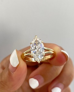 <b>Man</b> Made Diamond 1.50 Ct F Color VS1 Clarity Marquise Cut 18k Yellow Gold Split Shank Solitaire Engagement <b>Ring</b> IGI Certified - Product Image 1