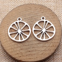 Breloque en forme de tranche de citron creuse 27x24mm en alliage de zinc, couleur argent, pour la décoration artisanale sur le thème des fruits d'été