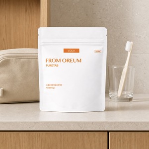 ยาสีฟันแบบเม็ดพกพา รสส้มซิตรัส จากโอเรียม พร้อมซองเติมยาสีฟันรสส้มเชจู - Product Image 1