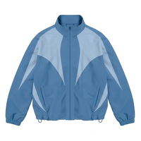 Tren Terbaru Setelan Celana Wind Breaker Pria Panel Hitam Abu-abu Logo Kustom, Jaket Vintage Kasual Satin Bernapas untuk Musim Panas