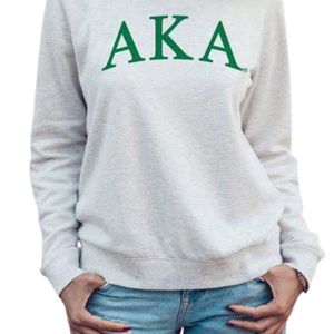 เสื้อสเวตเชิ้ตคอกลมสีขาว AKA พร้อมตัวอักษรกรีกโค้งสีเขียว ผ้าฟลีซ แบบสวมหัว ยูนิเซ็กซ์ เสื้อผ้าสำหรับชมรมนักศึกษา รับผลิตแบบ OEM ODM - Product Image 6