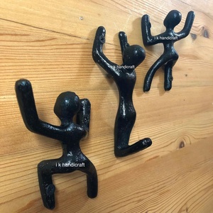 <b>Wall</b> <b>Hook</b> Sportsman Athlete Sculpture Cast Iron <b>Wall</b> Mount <b>Hook</b> Face Pattern Clothing Use Black Finish Decorative - Product Image 1