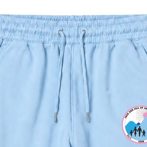กางเกงวอร์มขายาวปักลายตราสัญลักษณ์แจ็คแอนด์จิล สีฟ้าอ่อน ผ้าฟลีซเนื้อนุ่ม มีเชือกผูกเอวและกระเป๋าข้าง - Product Image 2