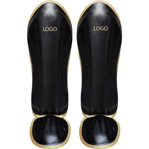 Espinilleras para boxeo con correa larga para un ajuste seguro, diseño compacto y ligero. - Product Image 1