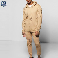 Survêtements déchirés de qualité supérieure et confortables pour jeunes, style décontracté, nouveau modèle.