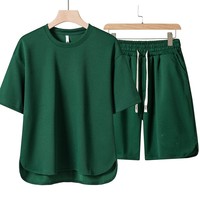 Ensemble décontracté élégant pour homme, col rond, manches courtes, couleur unie, tissu tricoté, impression sérigraphique personnalisée avec logo OEM, en stock