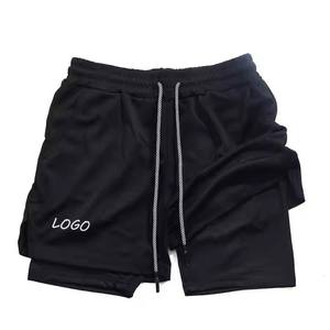 Shorts de sport pour homme, rouge, séchage rapide, taille mi-haute, cordon de serrage, couleur unie, tissu tricoté avec logo sur le devant - Product Image 2