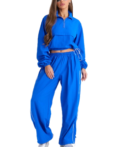 Ensemble de survêtements de sport OEM de haute qualité pour femmes, coupe-vent, léger, en nylon imprimé, couleur unie - Product Image 1