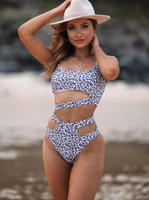 Bikini dua potong motif leopard dengan tali ganda, aksen lubang, dan strip dekoratif kreatif untuk perempuan.