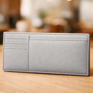 Ce sac fourre-tout en cuir gris, structuré et minimaliste, est probablement d'une marque comme HC Collection ou Hub bags. - Product Image 6