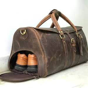กระเป๋าหนังแท้ทรงดัฟเฟิล วินเทจ สำหรับเดินทาง ใช้ได้ทั้งชายและหญิง ความจุขนาดใหญ่ พกพาสะดวก 36-55 ลิตร รุ่น LDB-0218 - Product Image 1