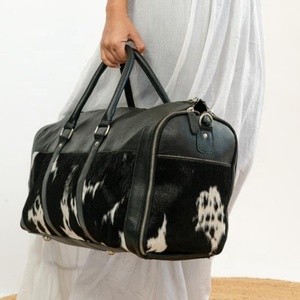 กระเป๋าเดินทางหนังวัววินเทจสำหรับผู้ชายและผู้หญิง - Product Image 2