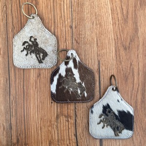 Nuevo pelo de moda en cuero de vaca grabado láser muñequera borla cremallera bolsa cuero de vaca grabado láser llavero Combo conjuntos - Product Image 3