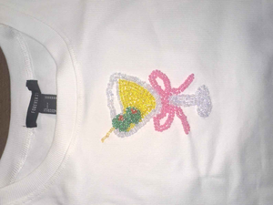 Hermosa Camiseta sin Mangas con Bordado Floral de Diseño, Adornos de Cuentas de Primera Calidad y Detalles Hechos a Mano Exclusivos y Modernos - Product Image 4