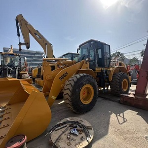 Chargeuse sur pneus puissante CATERPILLAR 966H conçue pour les tâches de construction exigeantes avec une fonctionnement stable et une haute productivité - Product Image 1