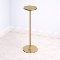 Table de bar élégante en aluminium moulé, design de piétement fin, plateau rond, base stable, profil minimal, finition durable, accent contemporain