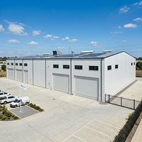 Atelier industriel préfabriqué en structure métallique durable, conçu avec précision, entrepôt industriel en métal