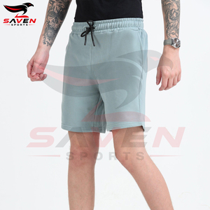 Pantalones cortos para hombre de color azul menta liso, transpirables, con logotipo propio, tela suave al tacto, con cordón en la cintura y bolsillos, estilo casual. - Product Image 3