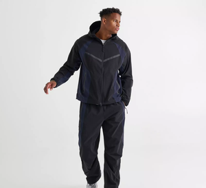 Pantalon de survêtement blanc surdimensionné pour homme, coupe large, avec empiècements latéraux contrastants noirs et détails de passepoil, taille à cordon de serrage, 100% coton, vente en gros sur mesure - Product Image 2